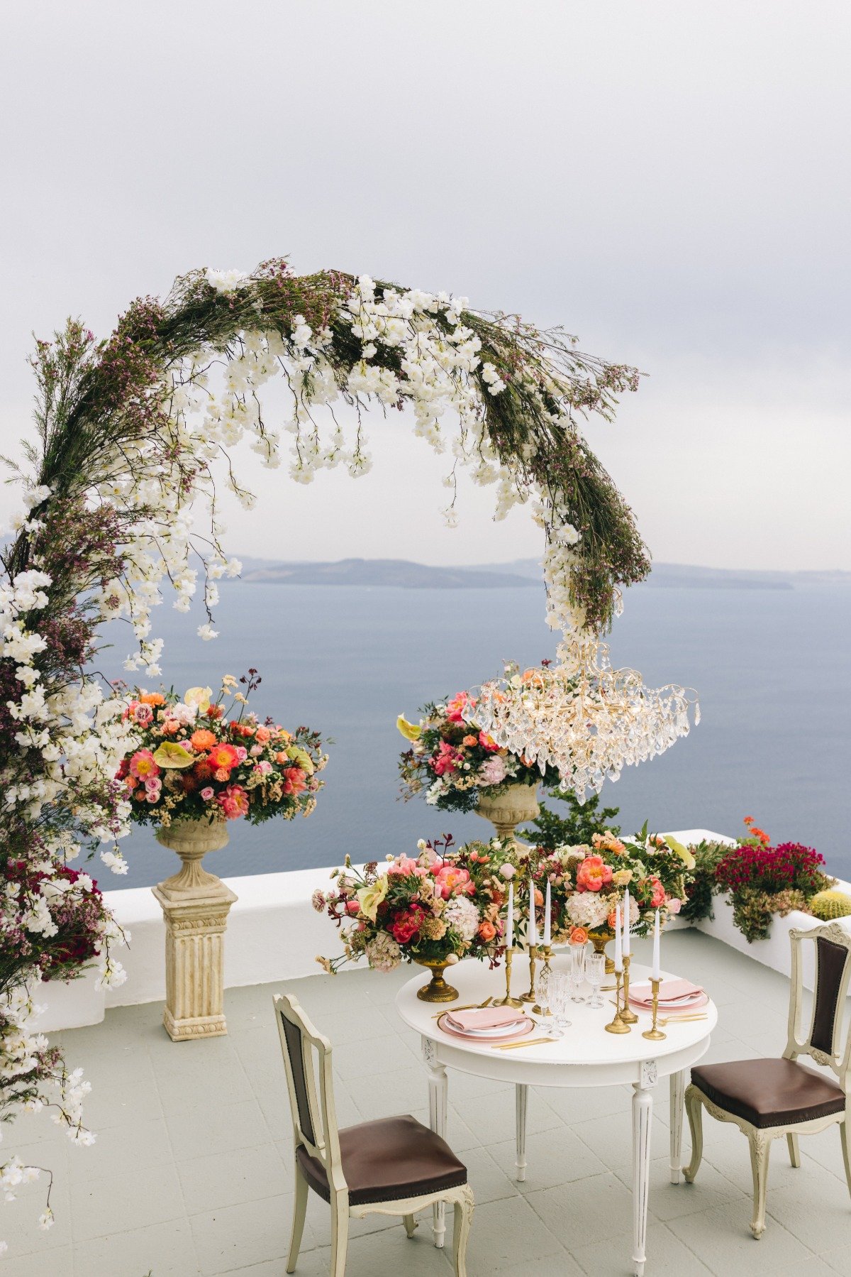 floral arch with chandelier