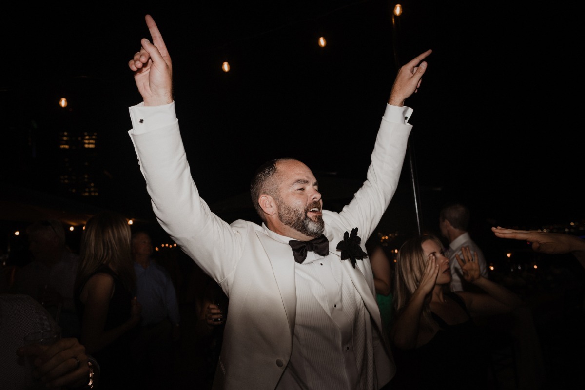 Groom at epic dance party 
