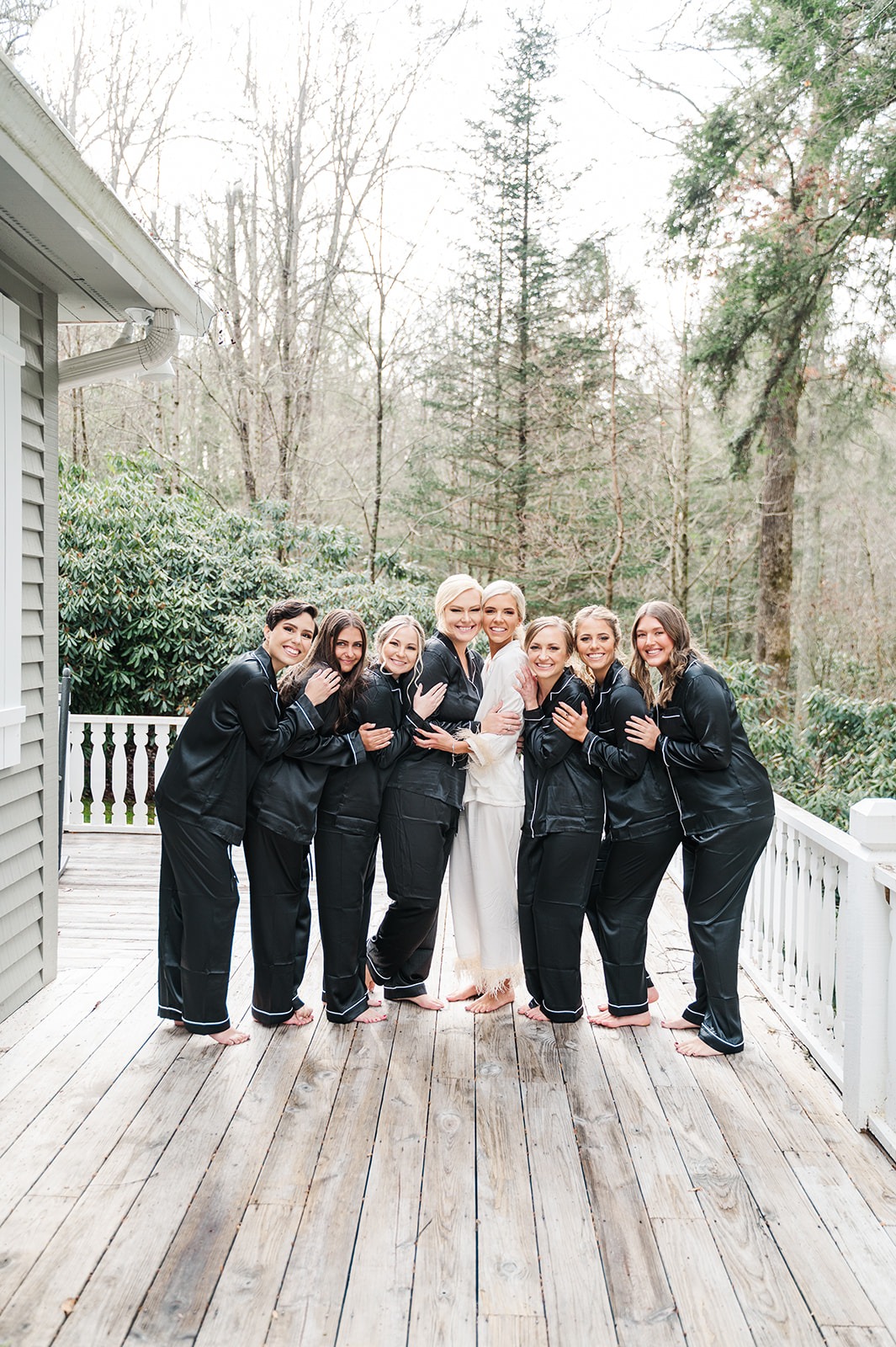 Bridesmaids in black matching pajamas