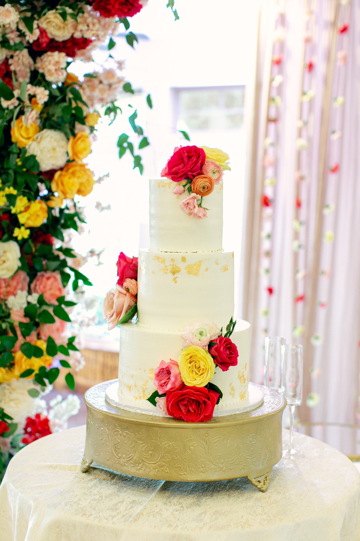 gold flaked wedding cake