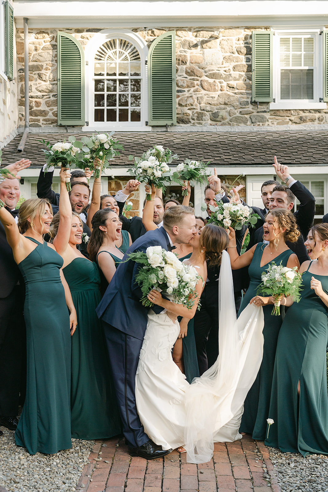 white and green garden wedding with dark green bridesmaid dresses