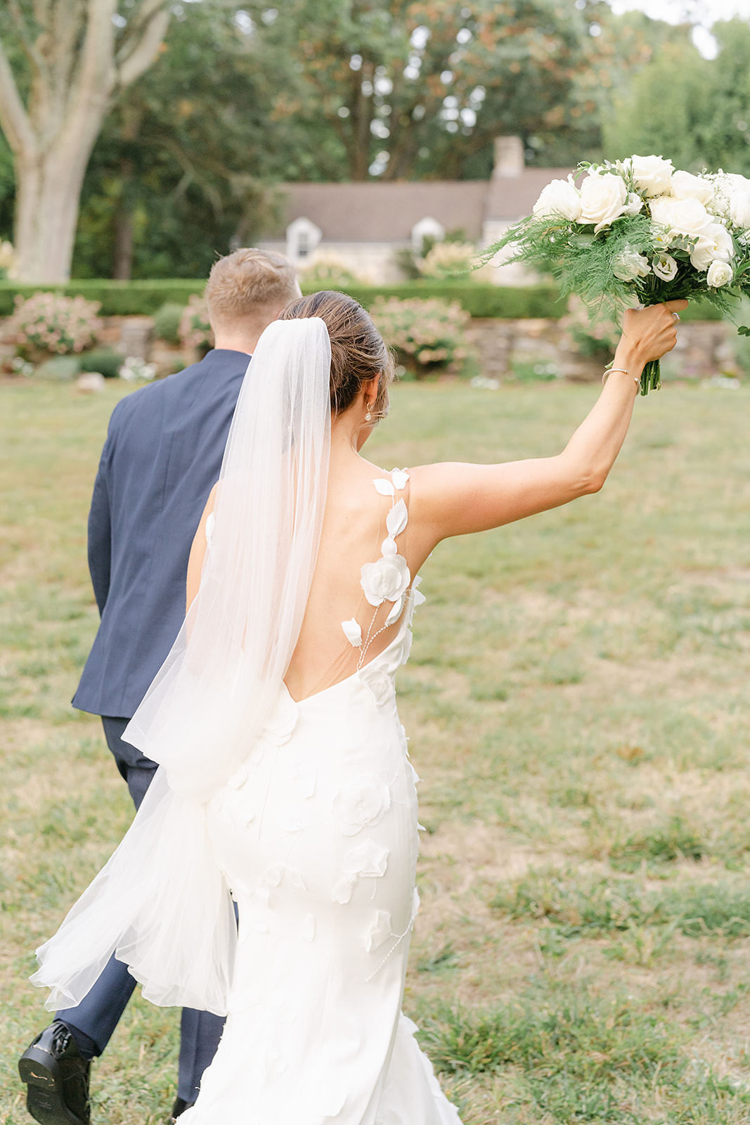 illusion back with floral appliques on mermaid wedding gown