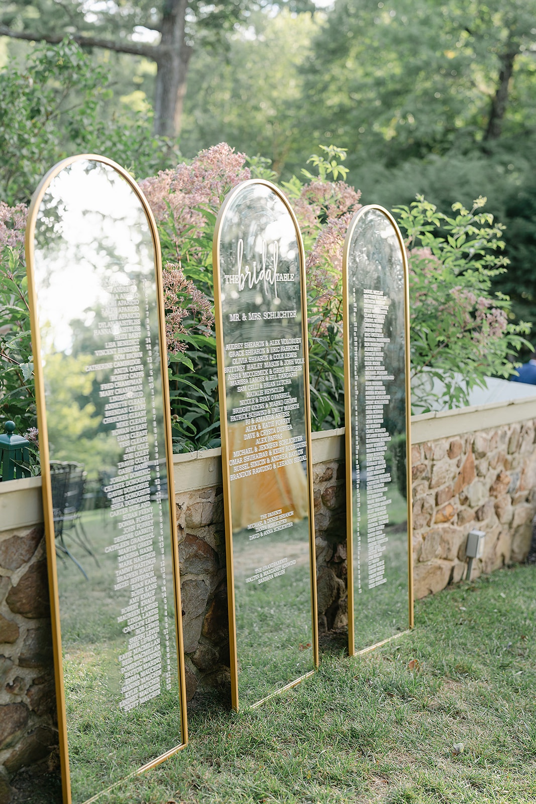vintage garden wedding decor with mirrored escort wall