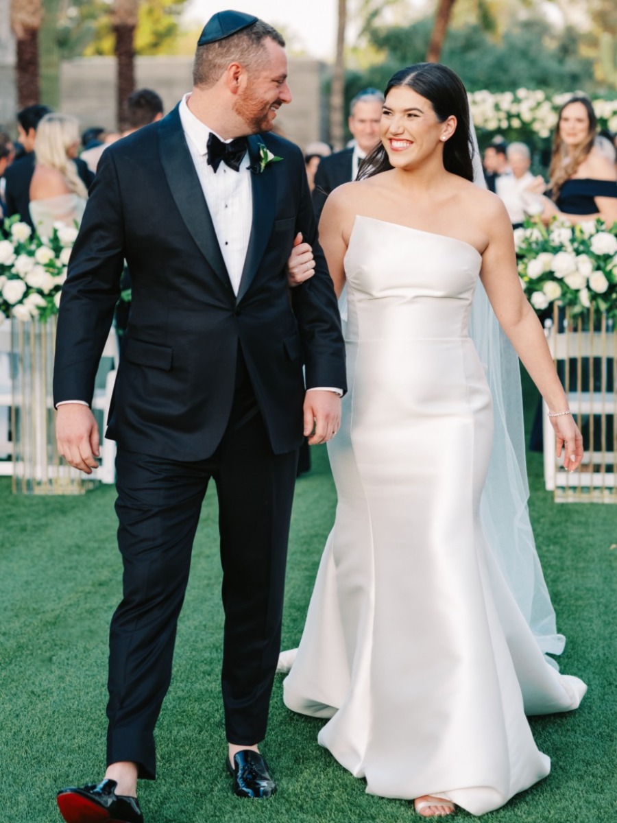 This couple got married among the flowers at the Arizona Biltmore