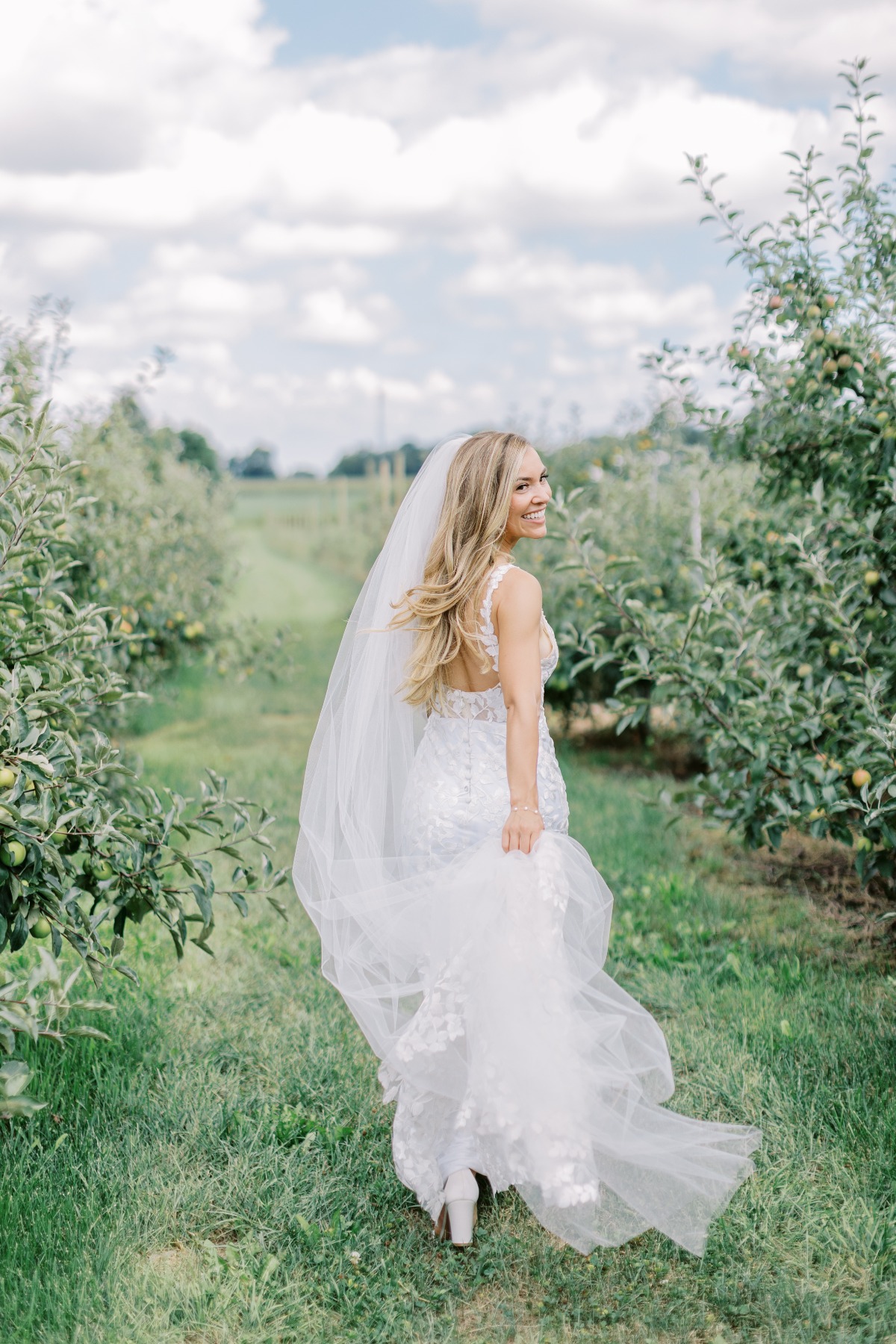 bride in apple orchard
