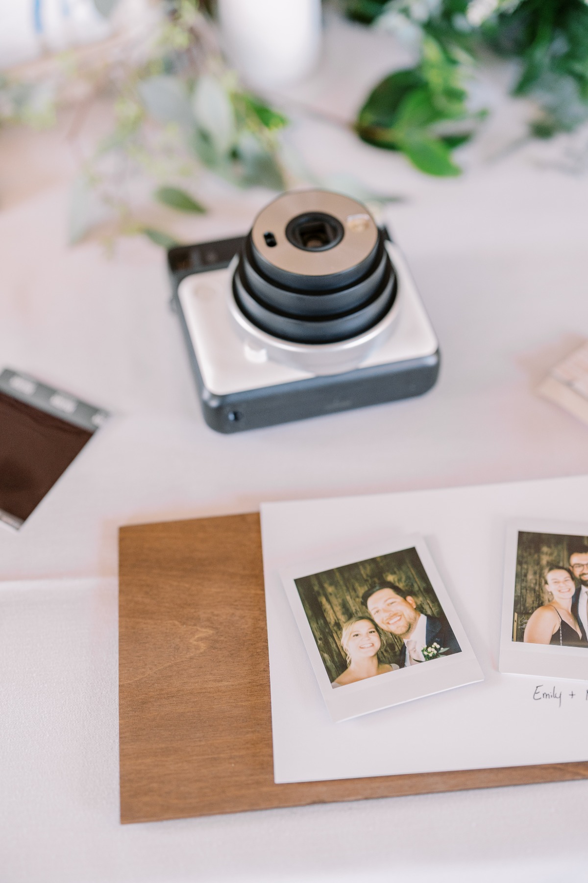 reception guestbook with Polaroids