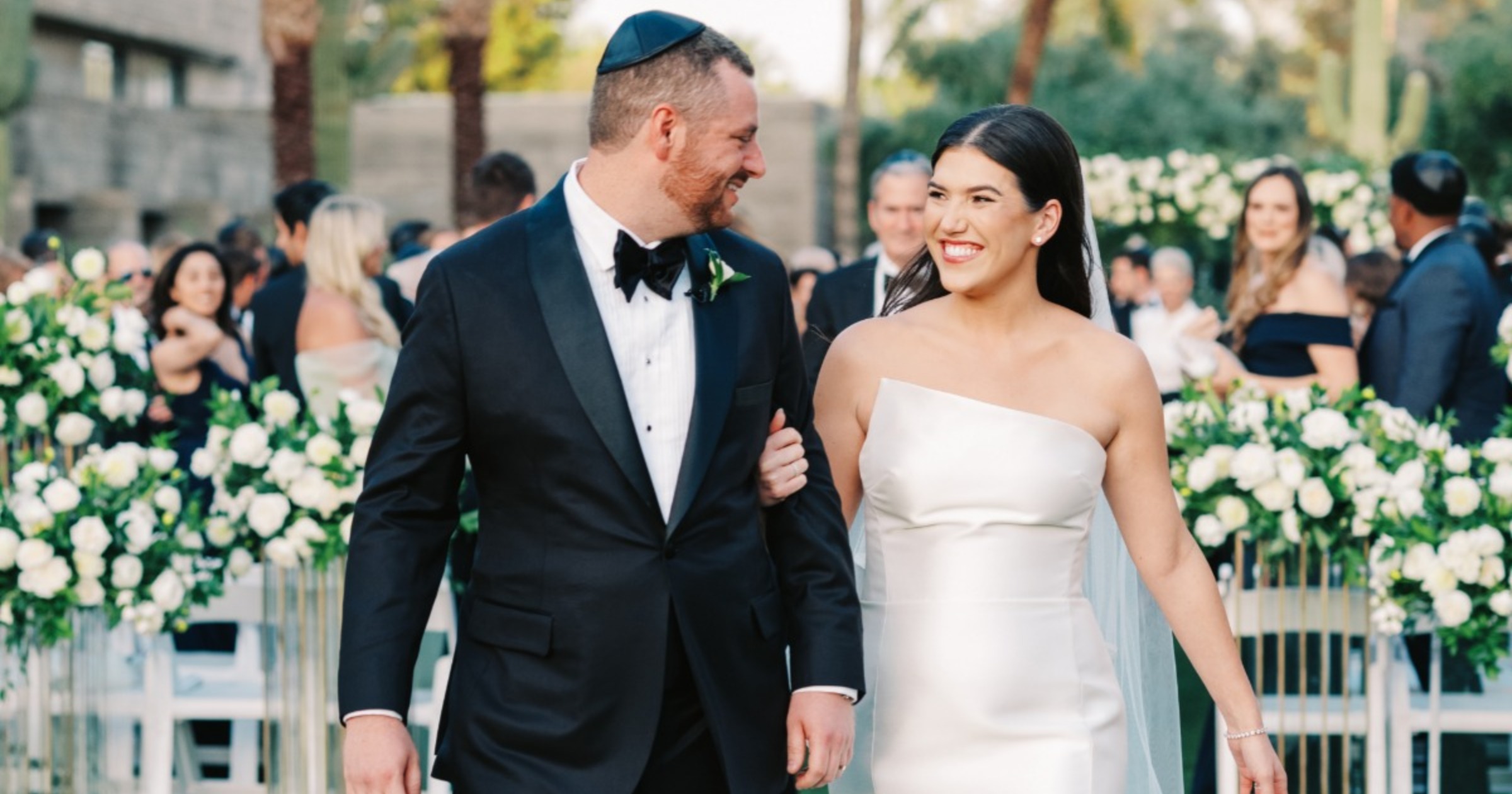 This couple got married among the flowers at the Arizona Biltmore