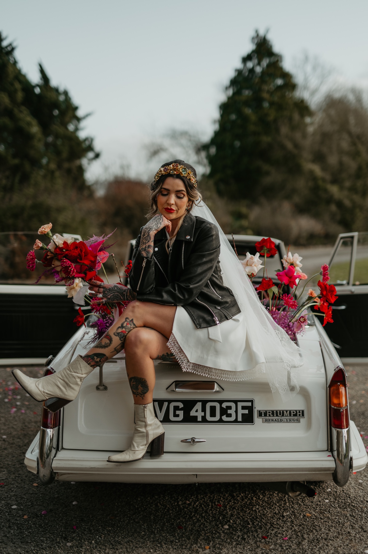 bride exit look with vintage car and bouquet