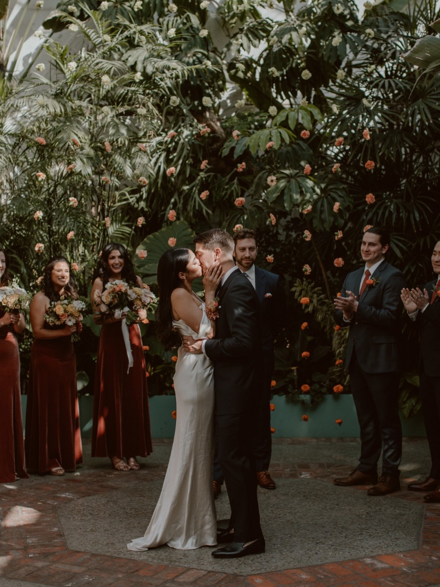 A colorful wedding under curtains of marigolds at The Valentine in LA