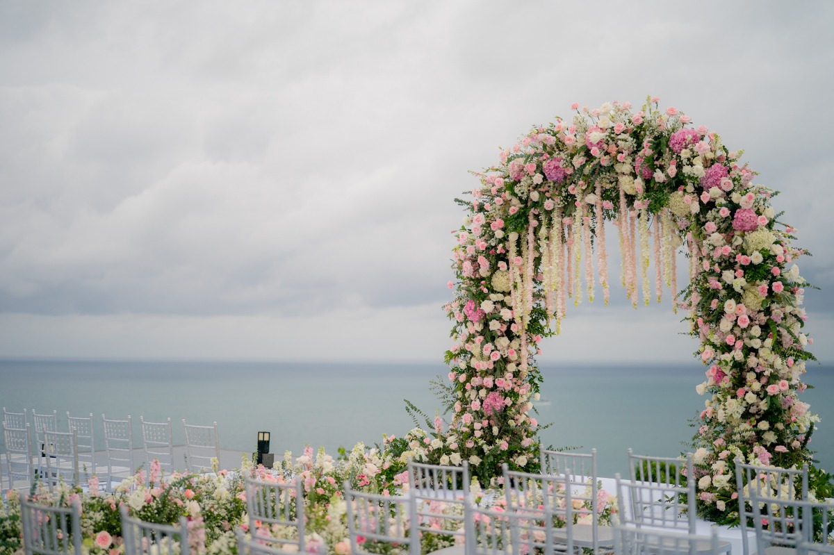large shades of pink floral arch