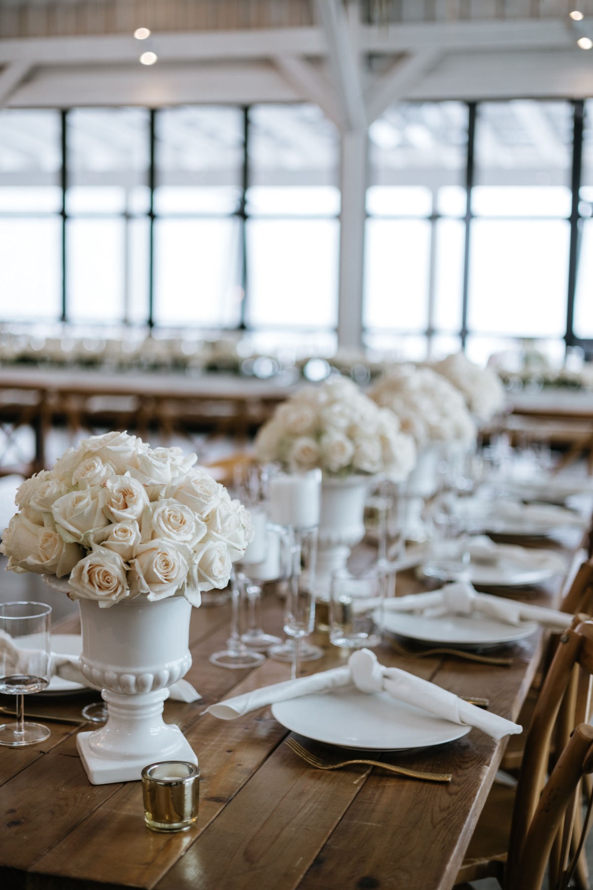 all white rose wedding arrangements