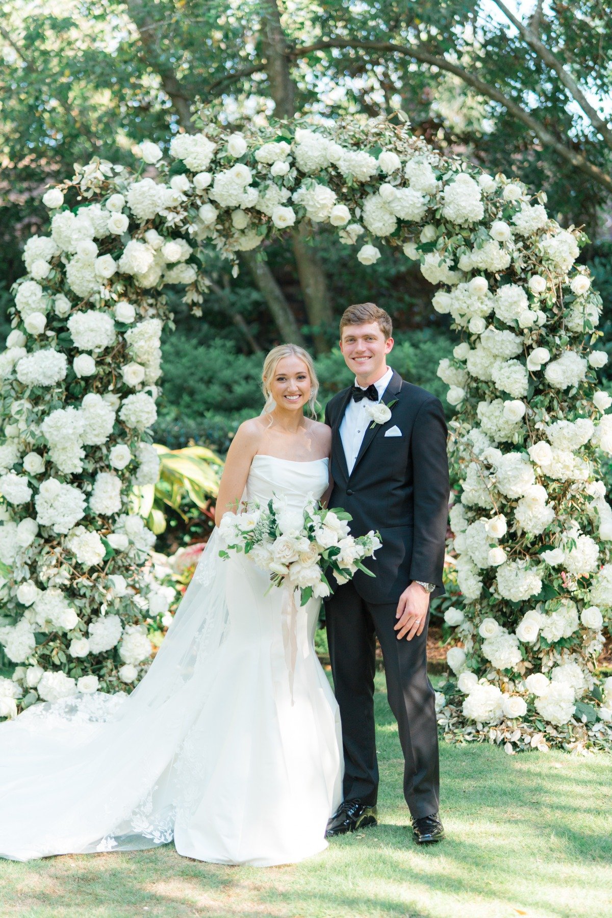 white floral wedding arch