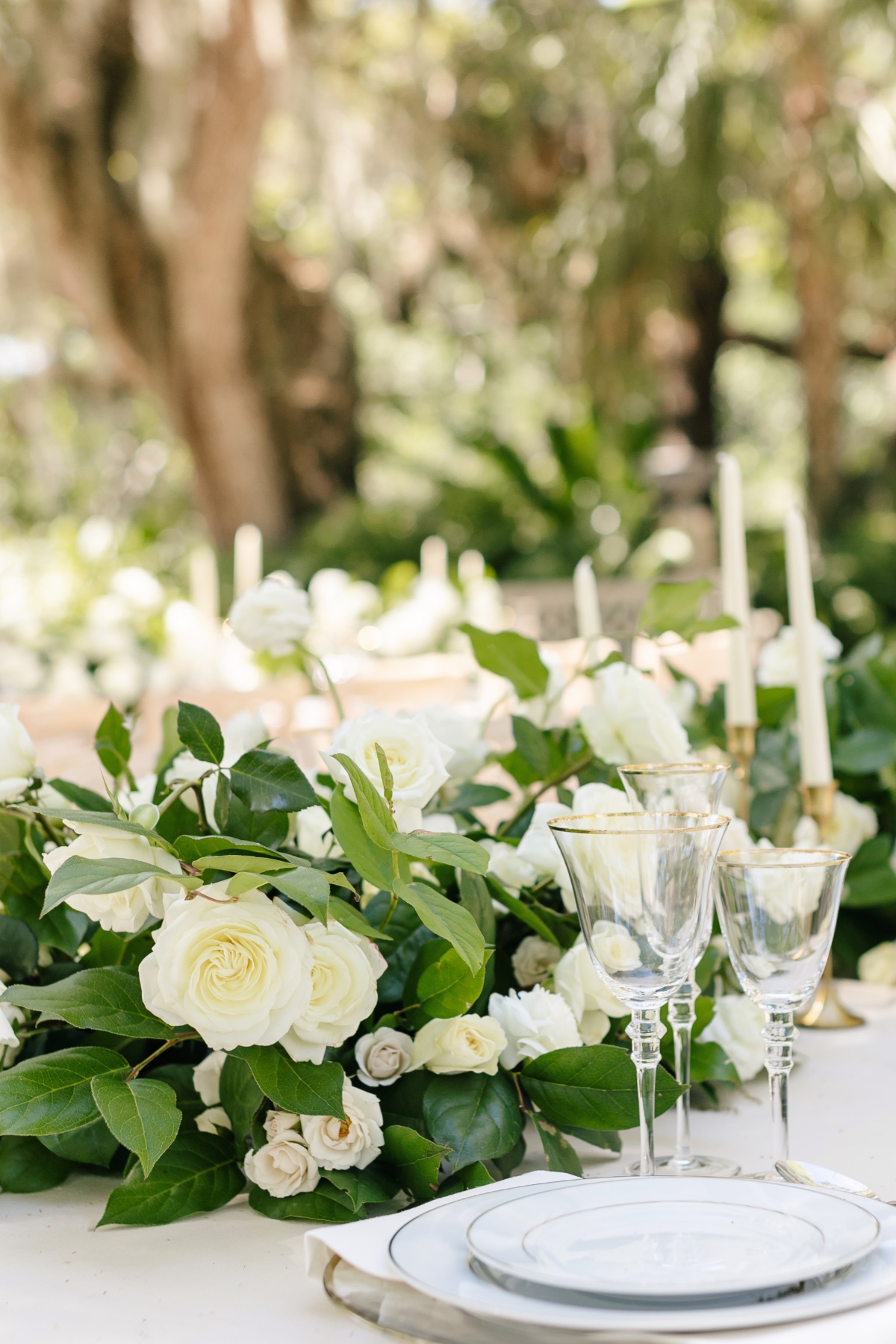 white and greenery centerpieces