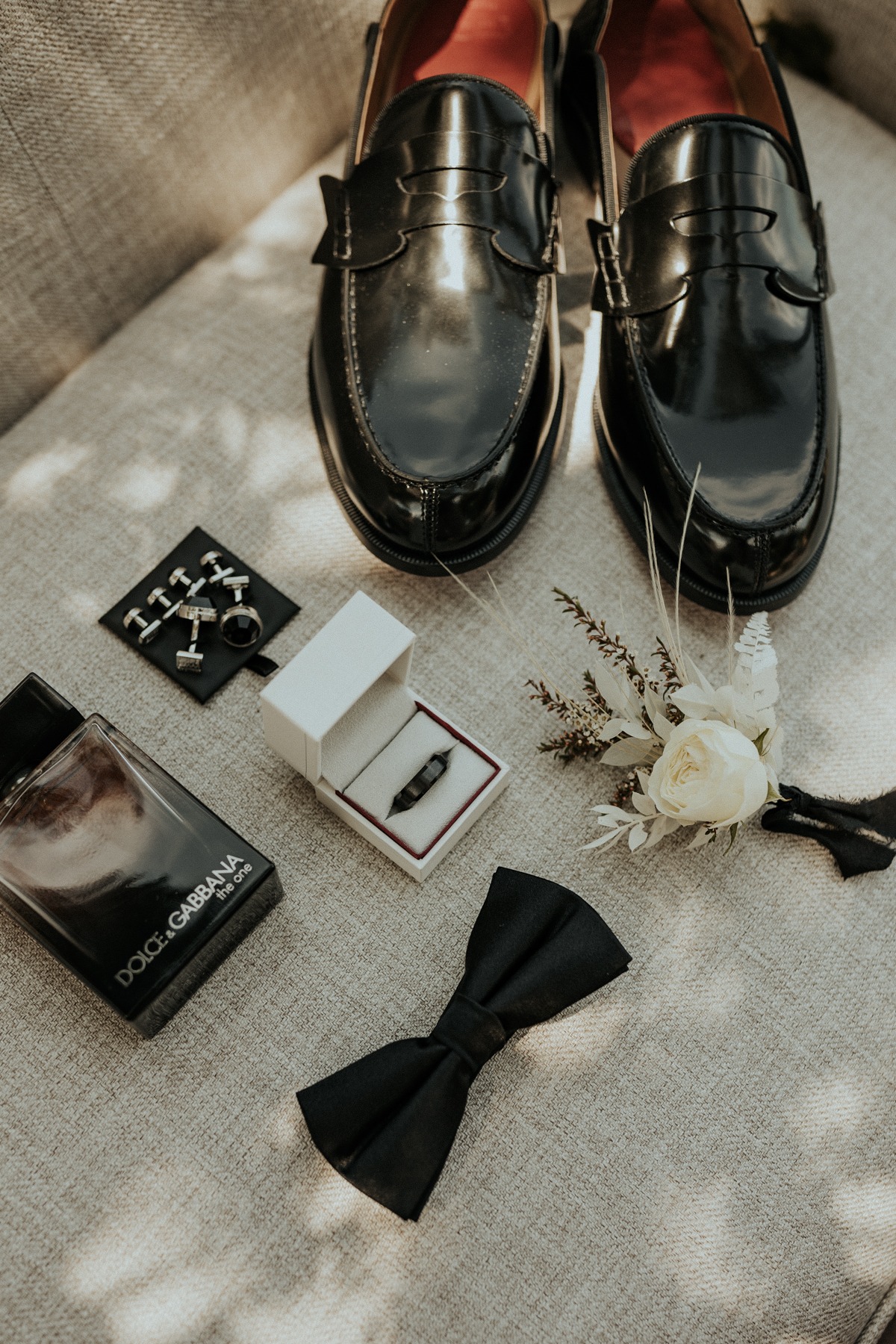 black accessories for the groom