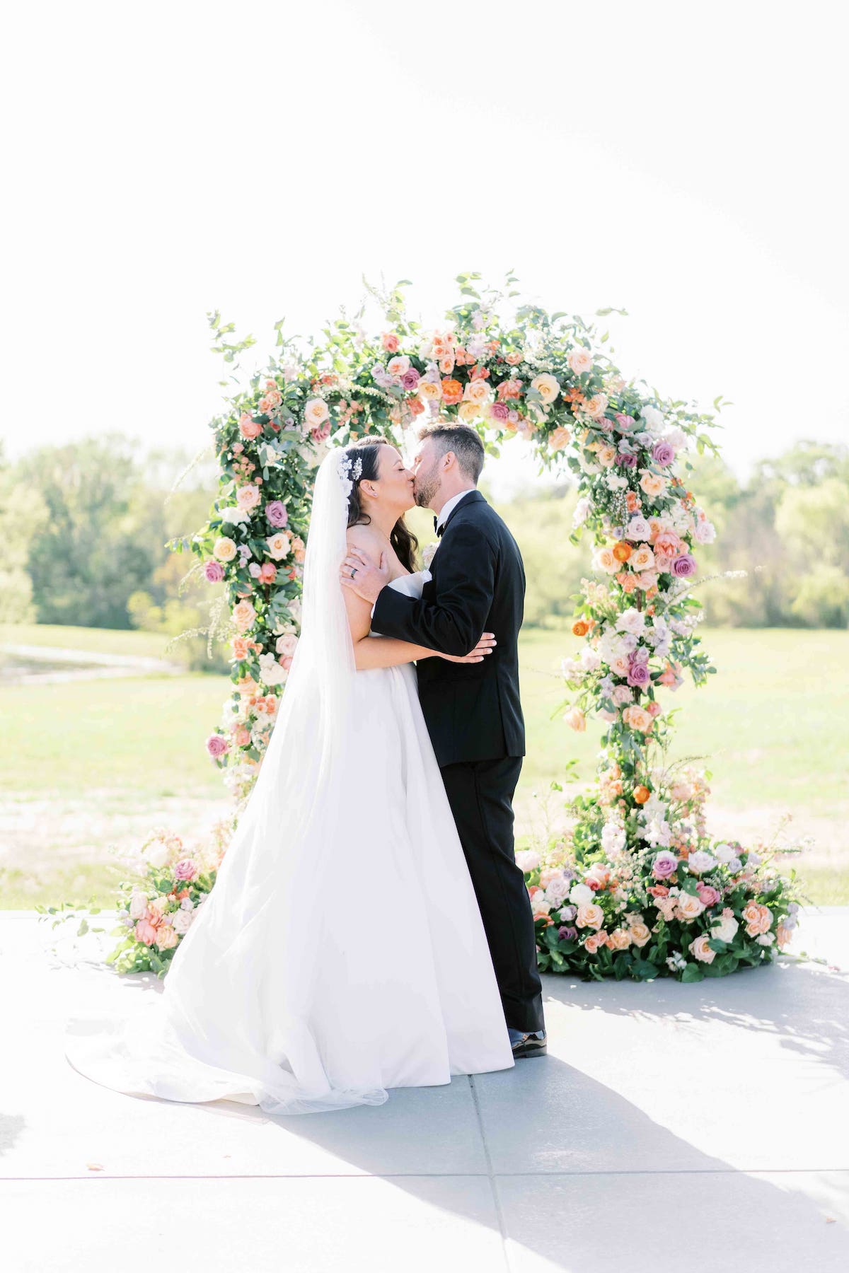 pastel flower wedding arch