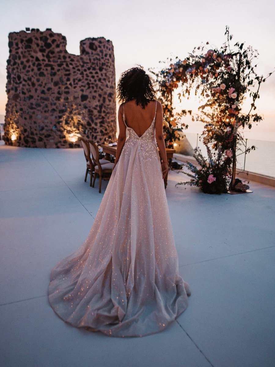 There's no better wedding inspo than summer flowers and Santorini