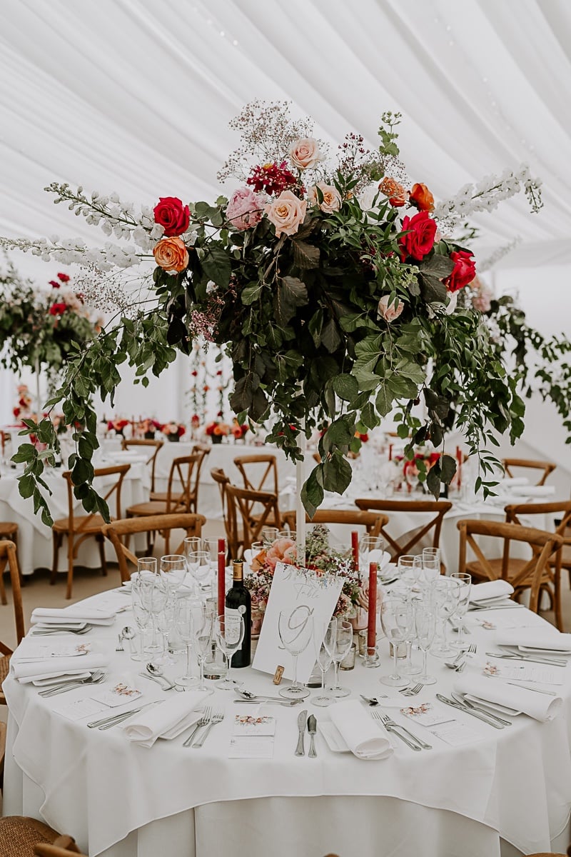 red pink and white elevated reception centerpieces