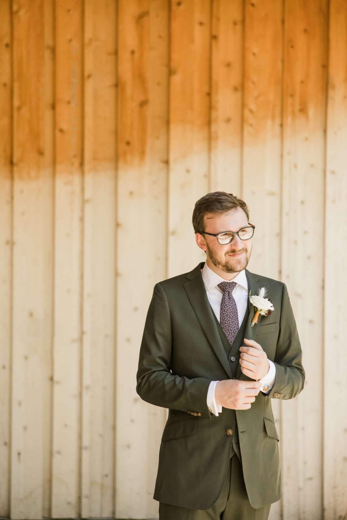 groom in olive 3 piece suit