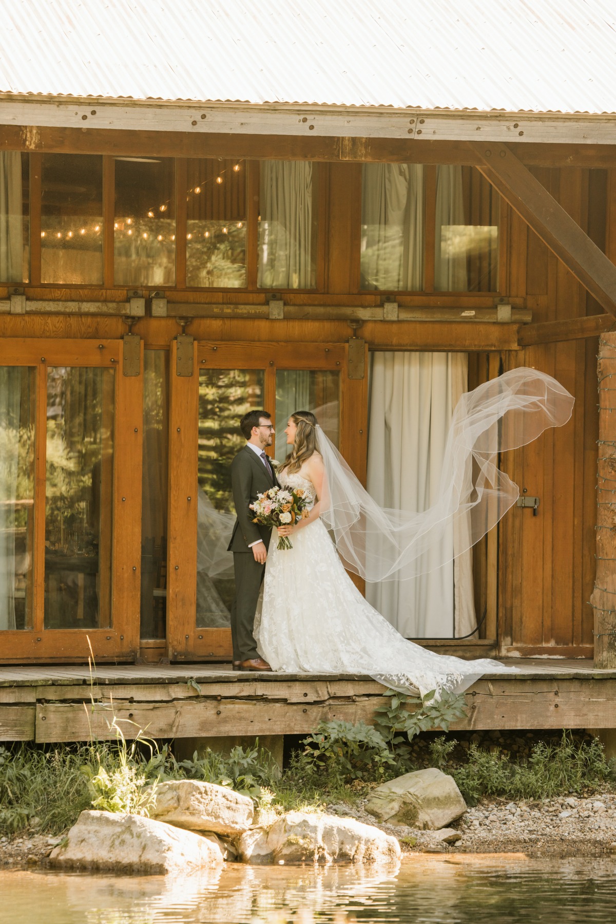 bride and groom at rustic mountain venue