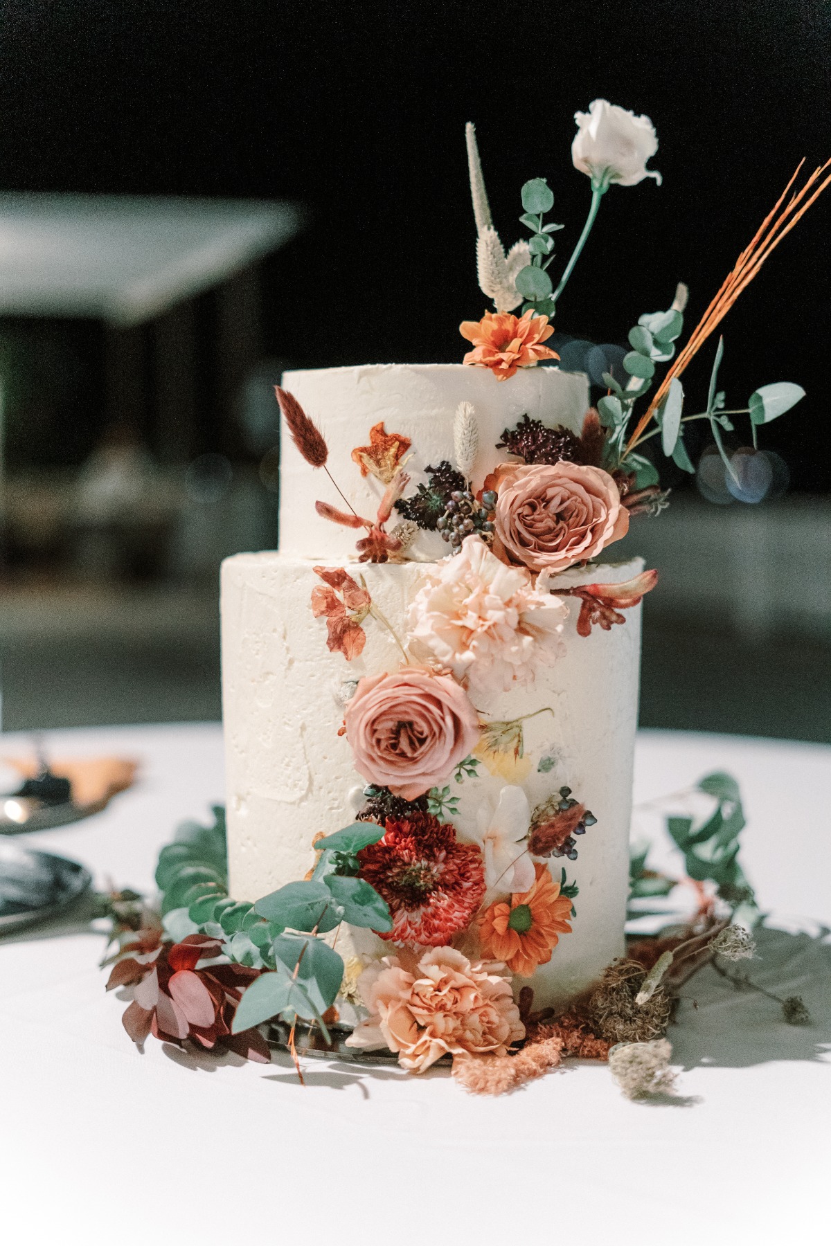 earth-toned floral wedding cake