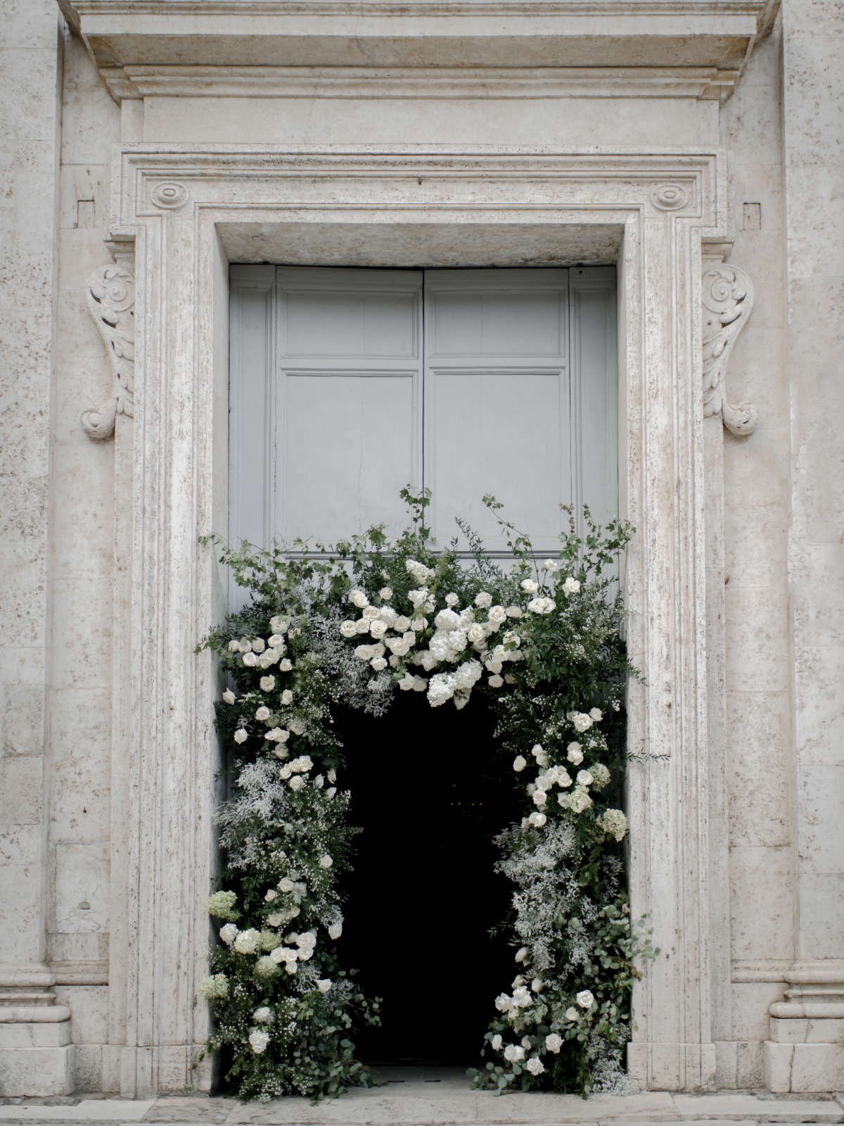 white rose and baby's breath floral installations
