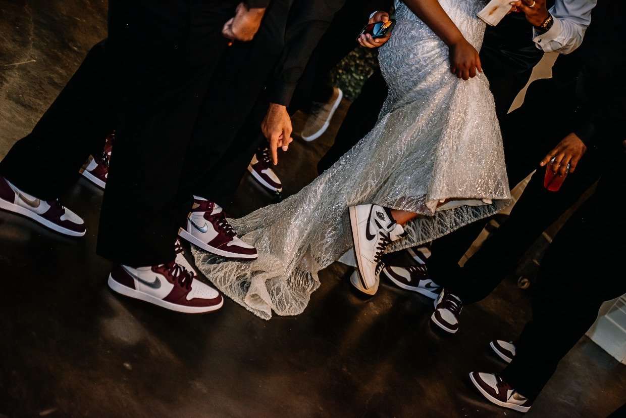 matching Jordan sneakers at wedding