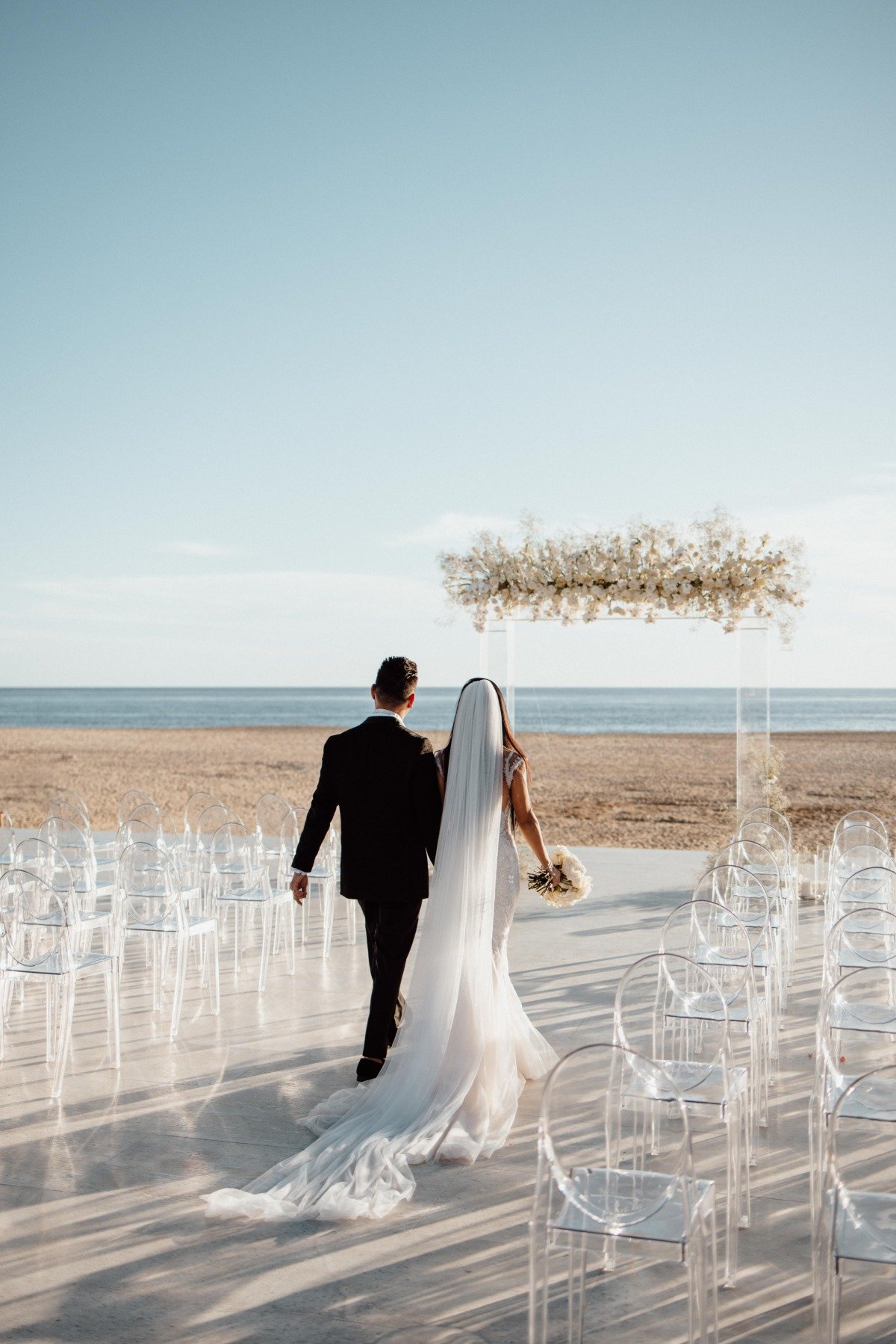 clear furniture for beach wedding