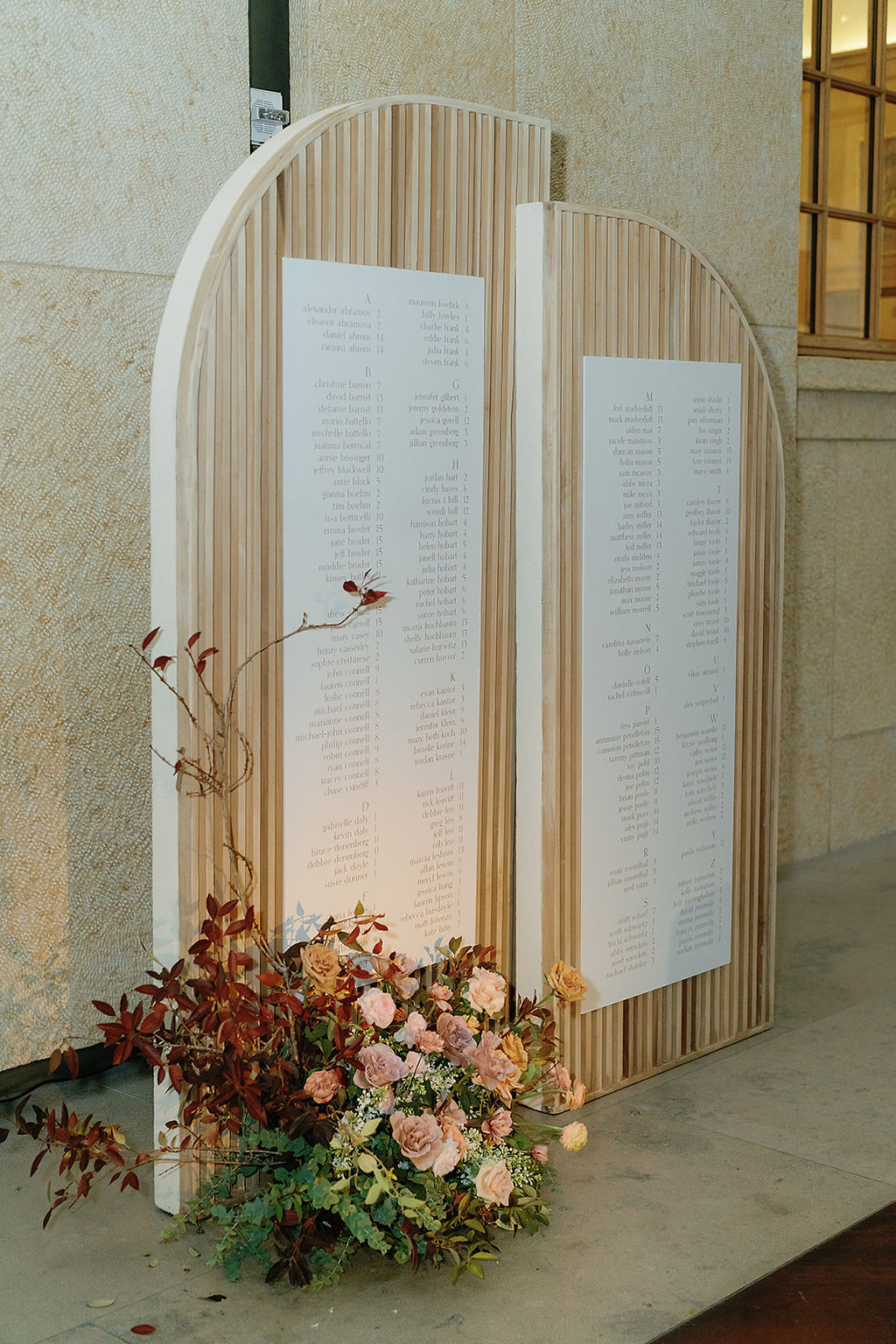 modern raw wood arches for guest chart at fall wedding