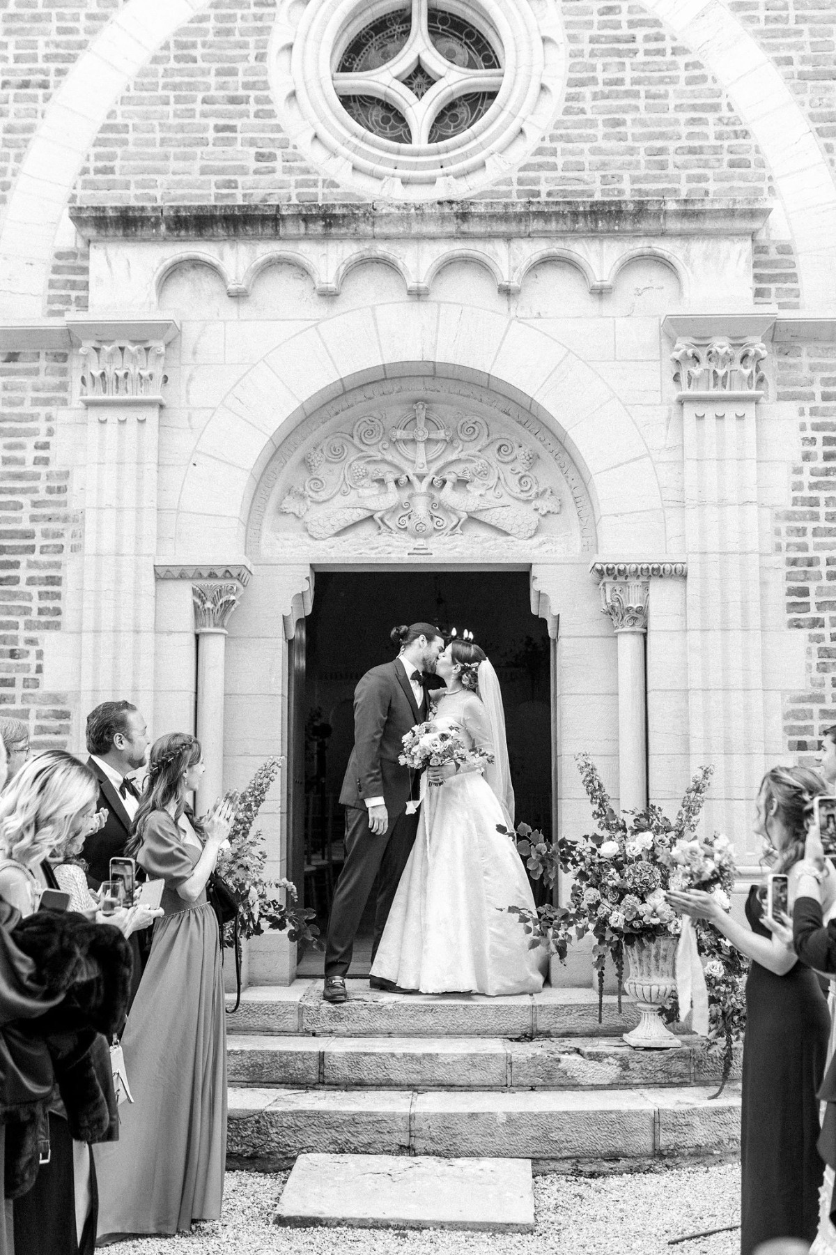 Chapel kiss at destination French wedding
