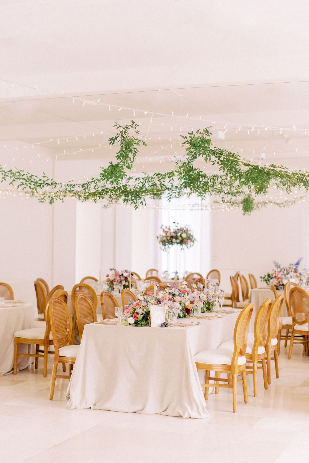 Colorful indoor greenery wedding reception
