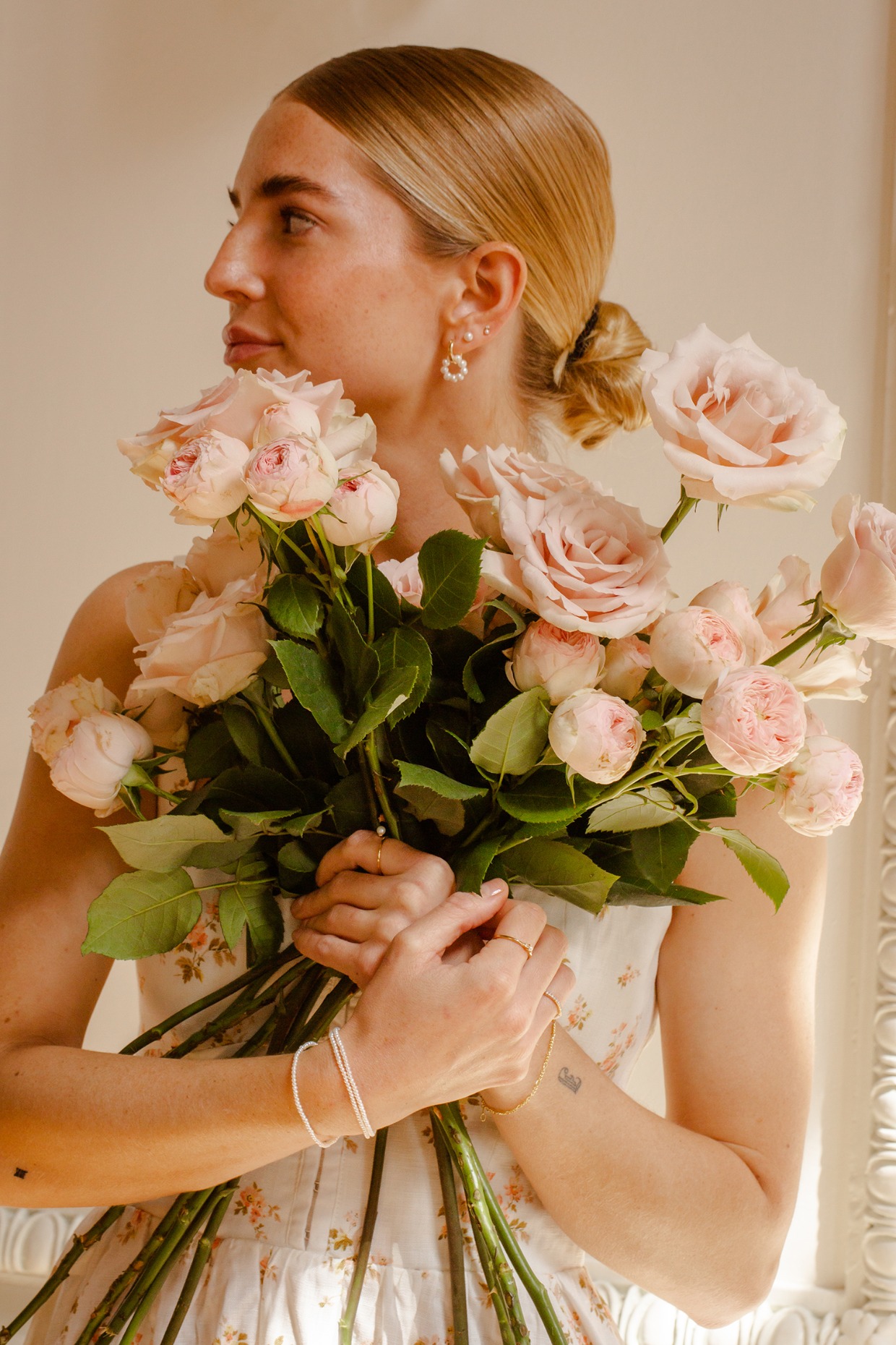 bridesmaid wearing pearl jewelry by Made by Mary