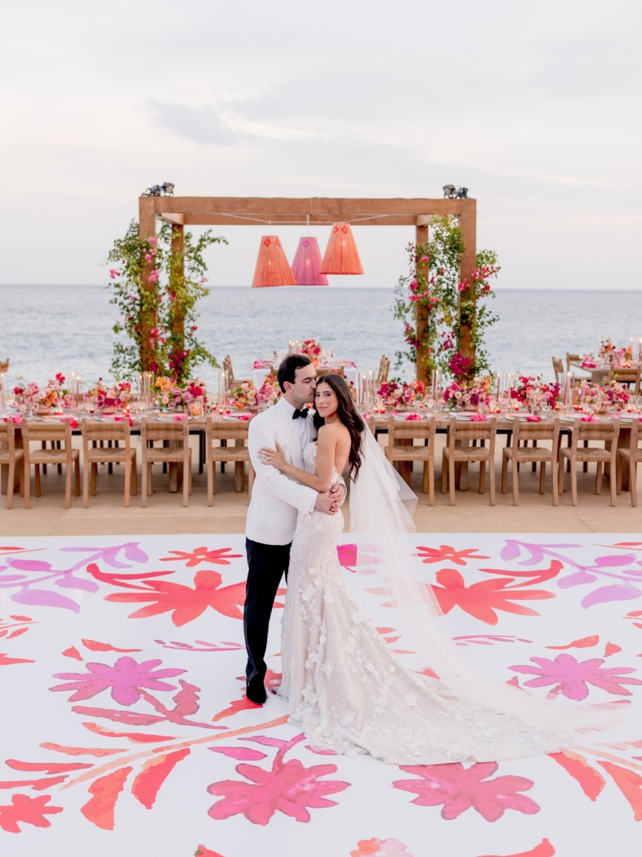 This colorful Cabo wedding is giving us boho Barbie vibes! 