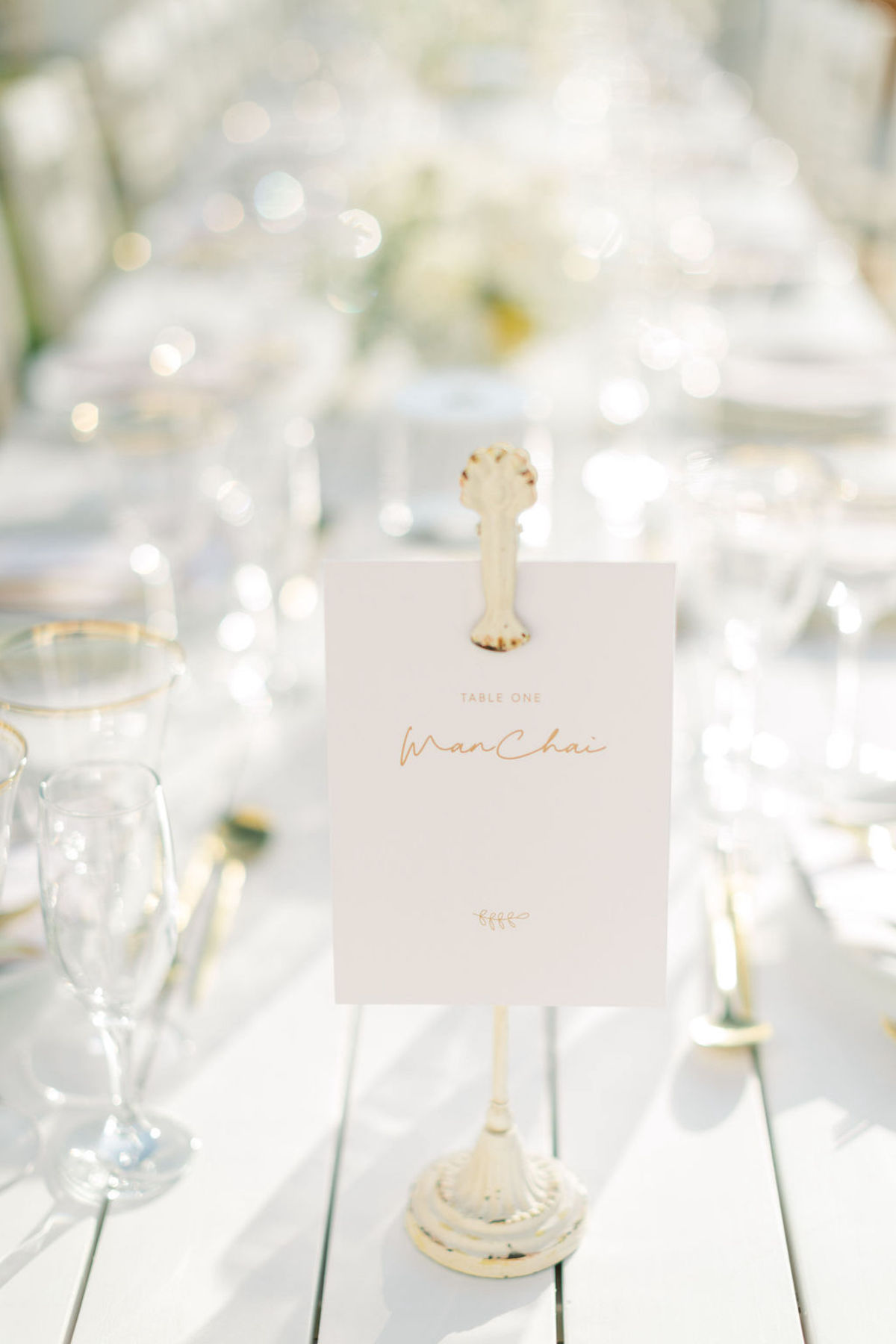 simple gold lettered table numbers
