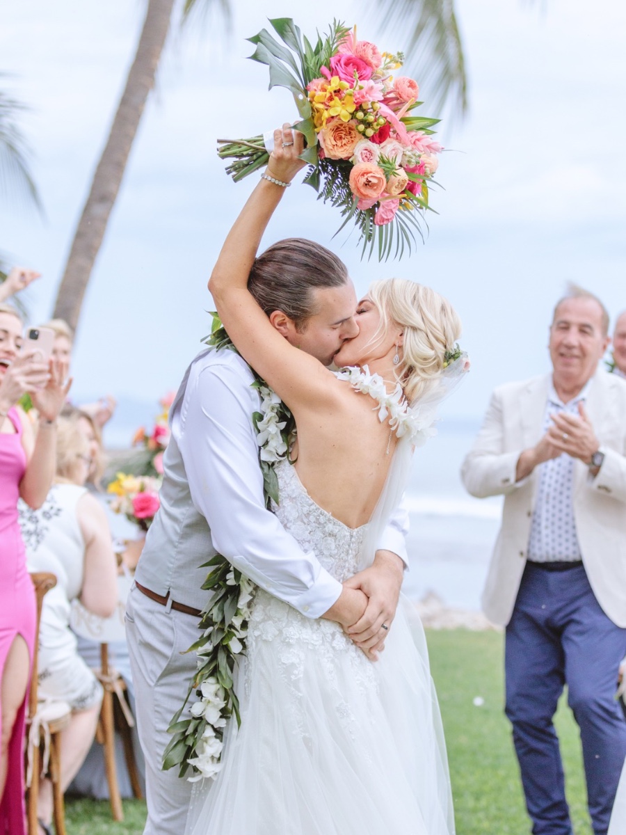 Tropical florals took center stage at this sophisticated Maui wedding
