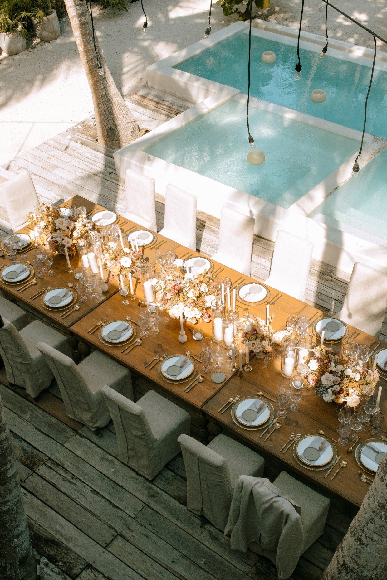 S.O.S. Planners poolside wedding reception set up