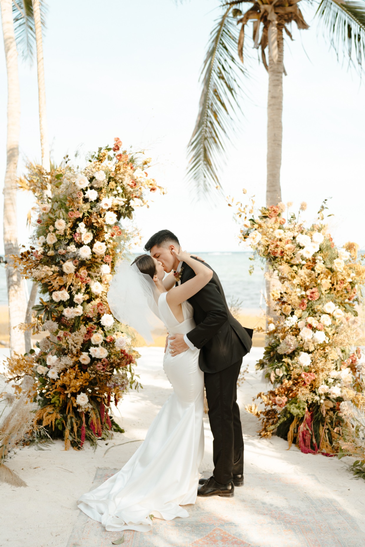 S.O.S. Planners Mexico destination wedding bride and groom at beach wedding