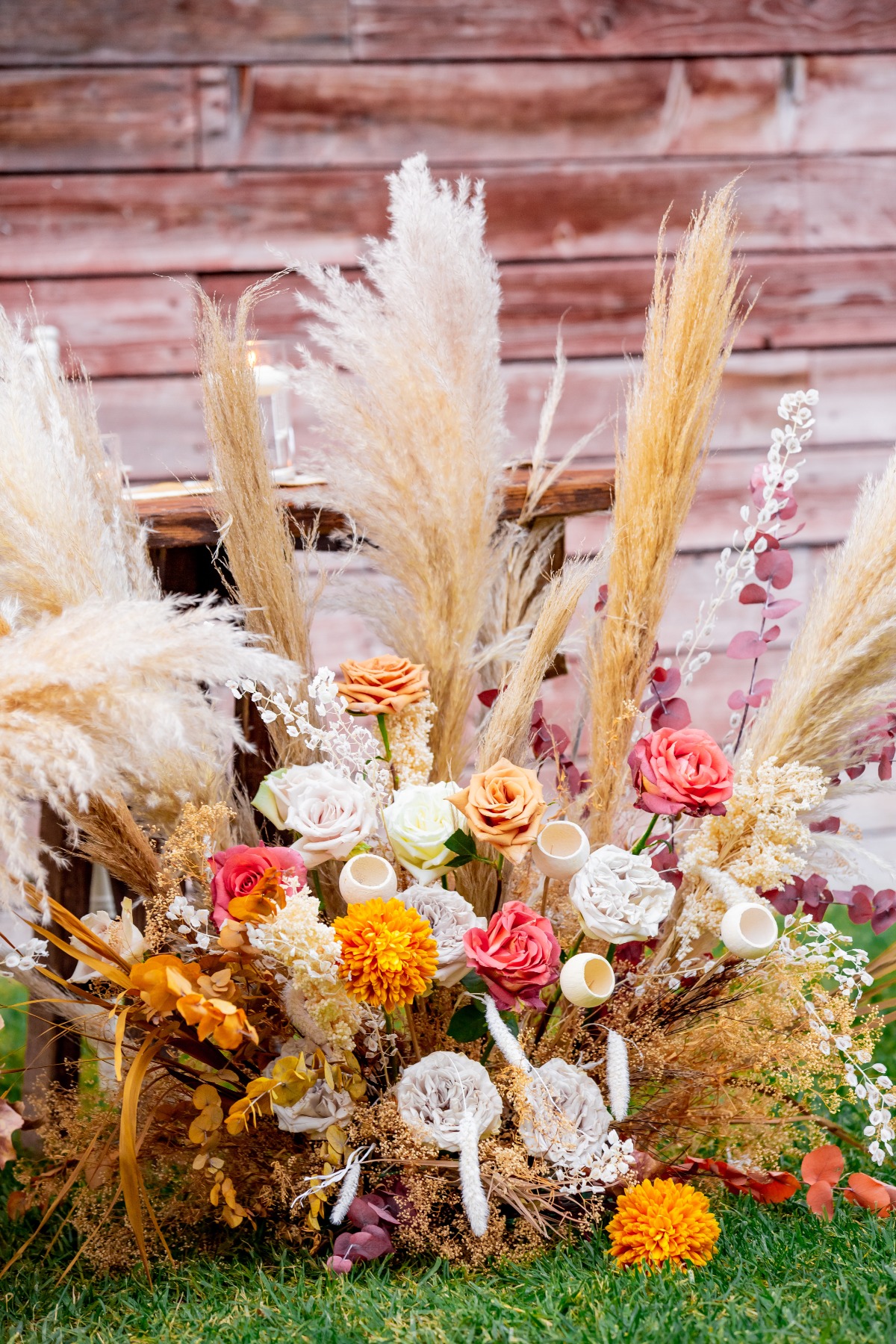 beautiful dried and live fall floral arrangement 