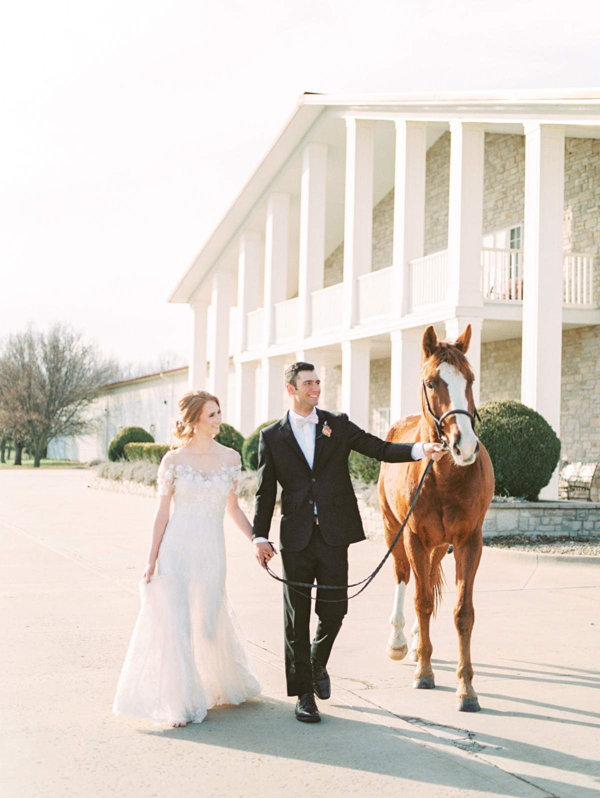 Wedding couple with their own horse