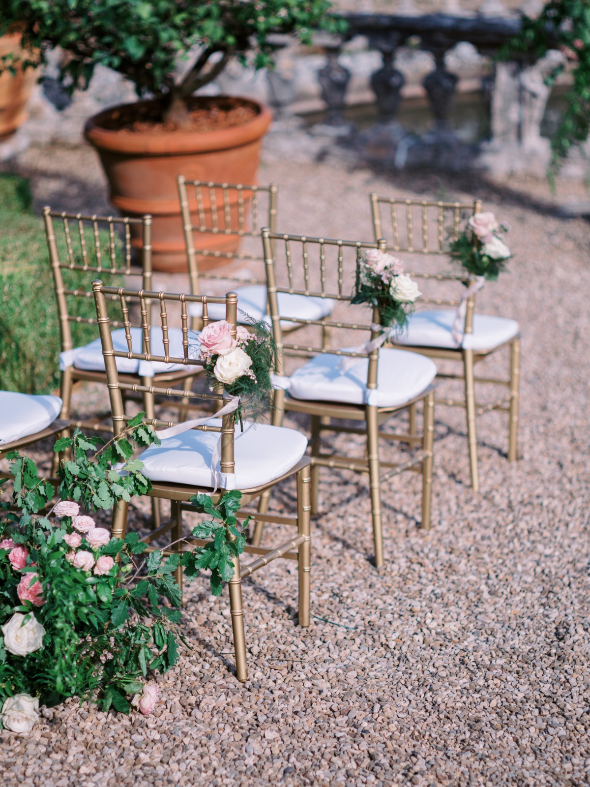 floral designs for ceremony chairs