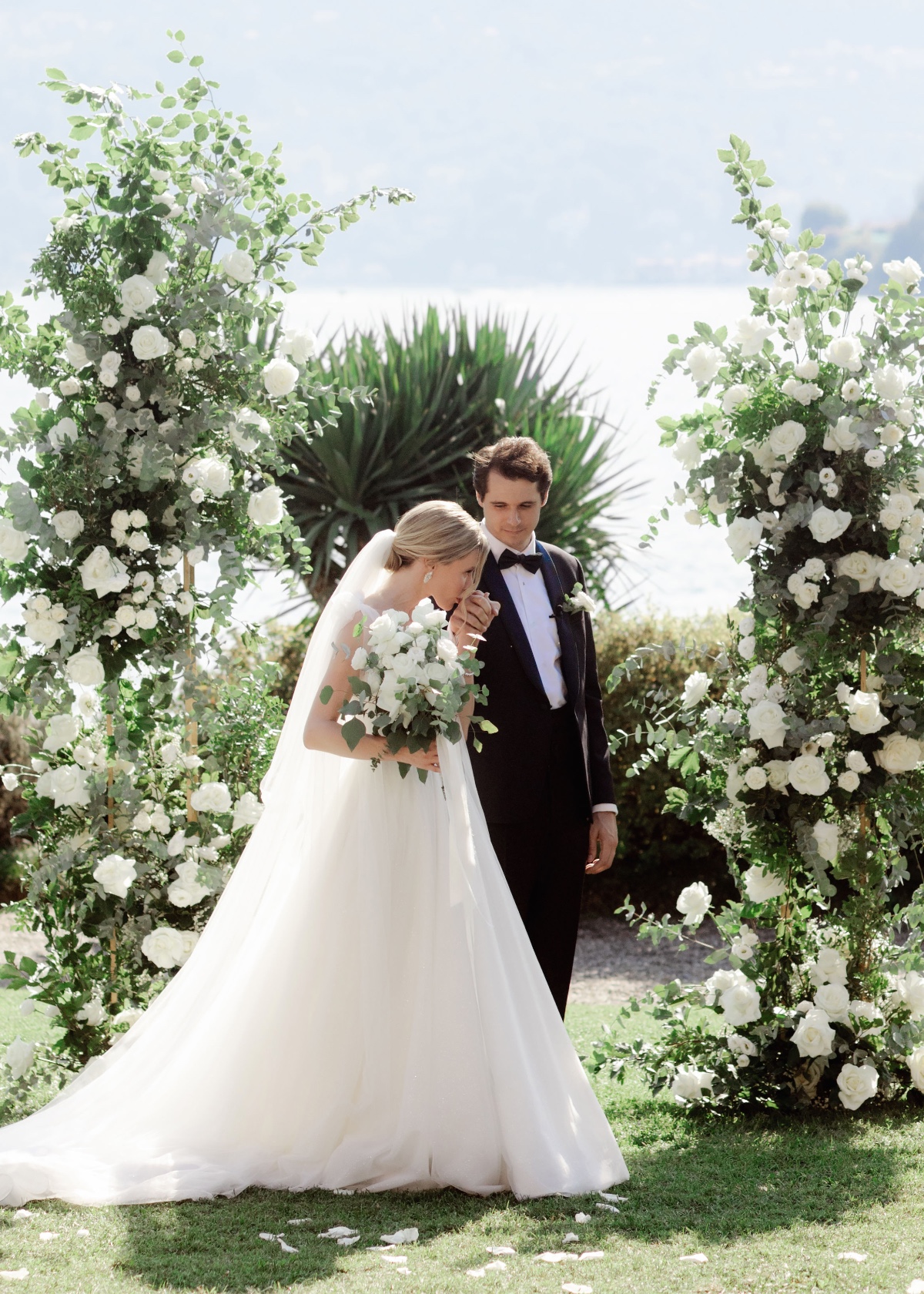 Chic bride and groom at floral wedding