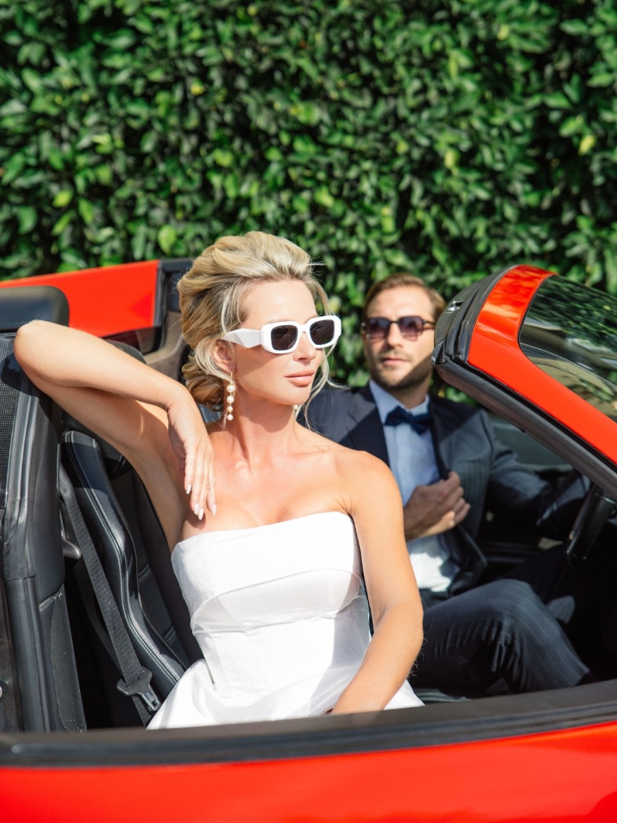 This bride showed up to her Italian ceremony in a classic red Ferrari