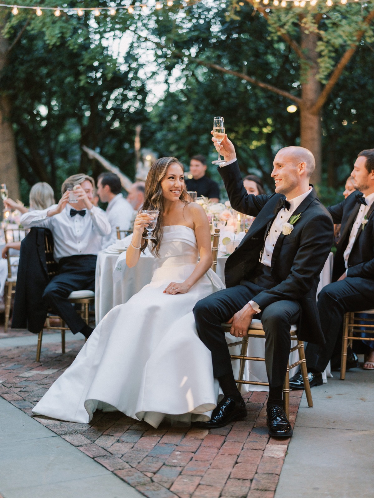 bride and groom toasting