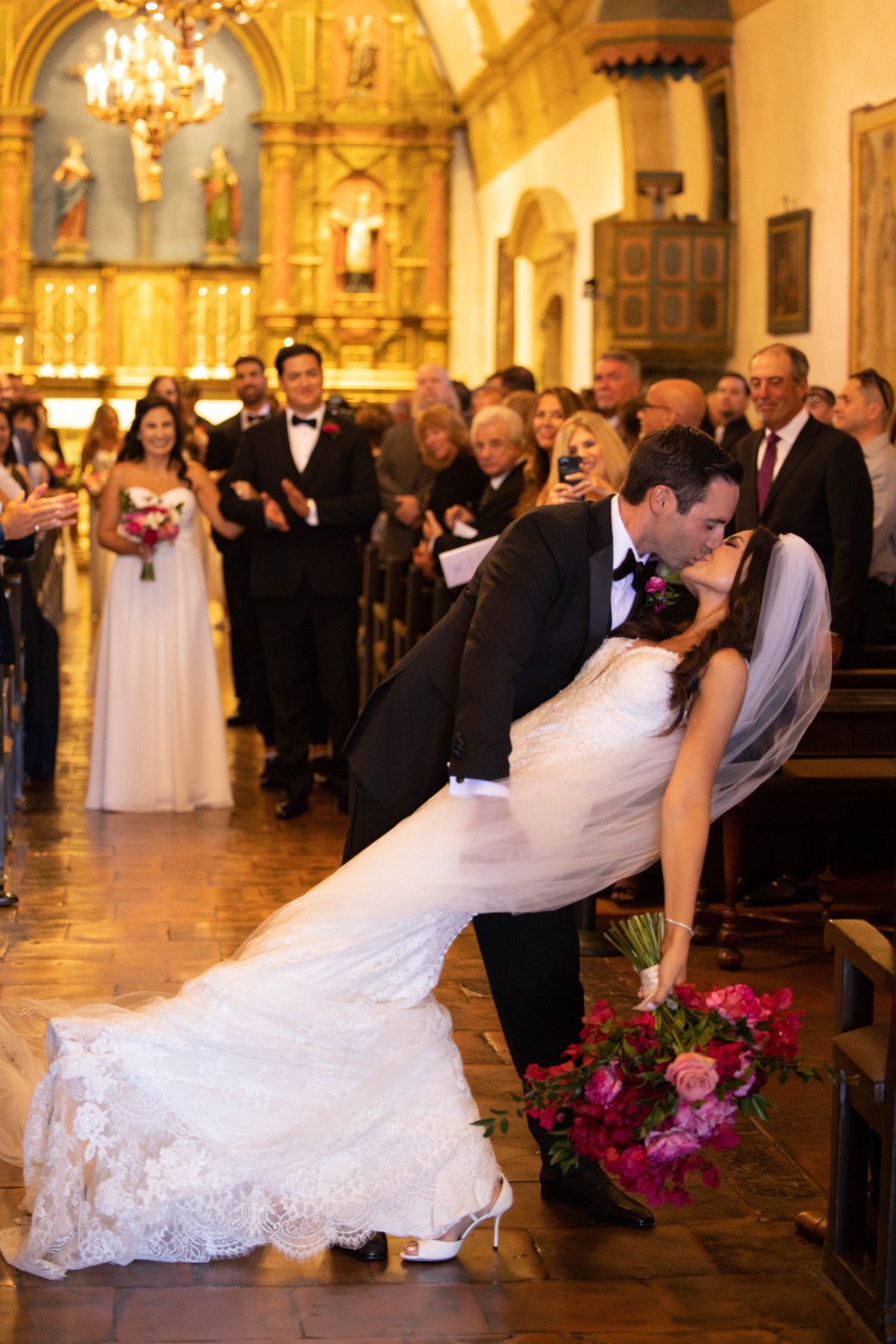 First kiss at cathedral wedding