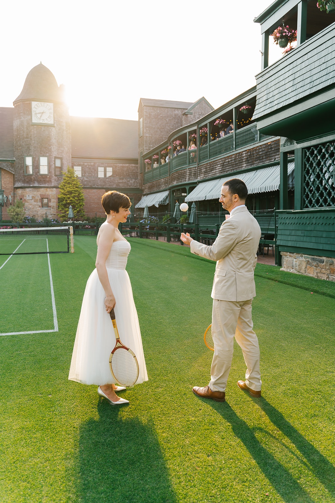 Couple playing tennis for portraits