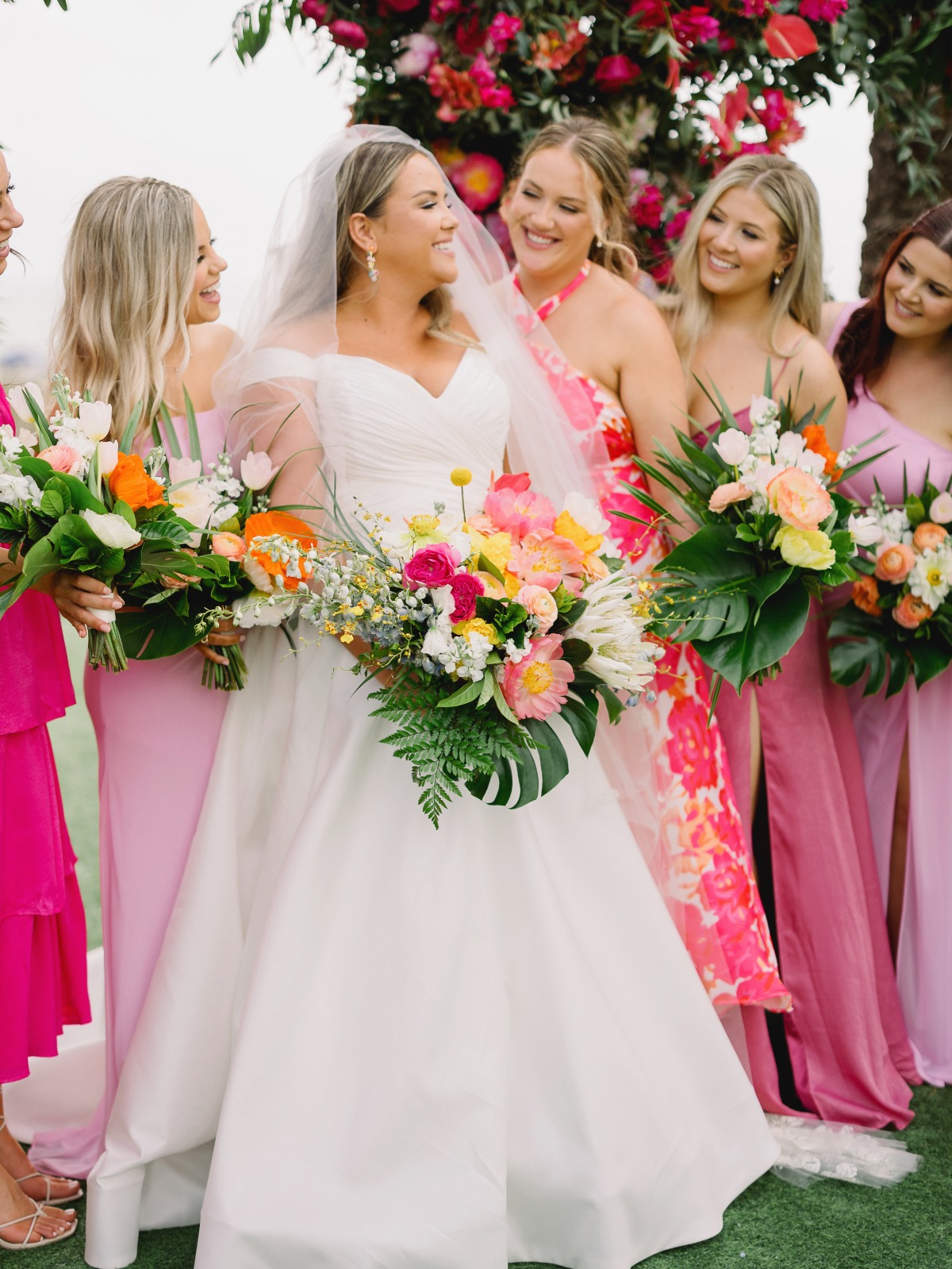 tropical wedding with pink bridesmaid dresses