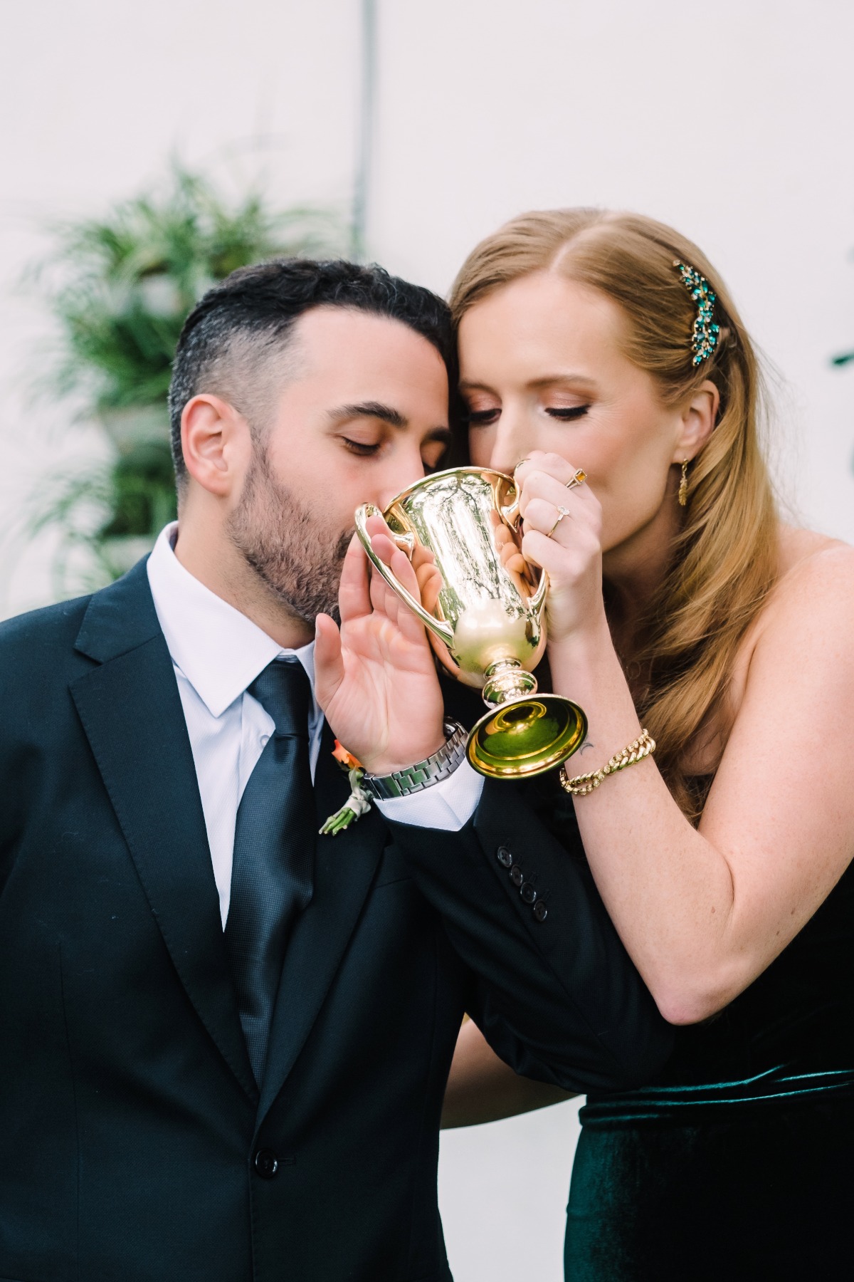 Couple drinking out of wedding goblet