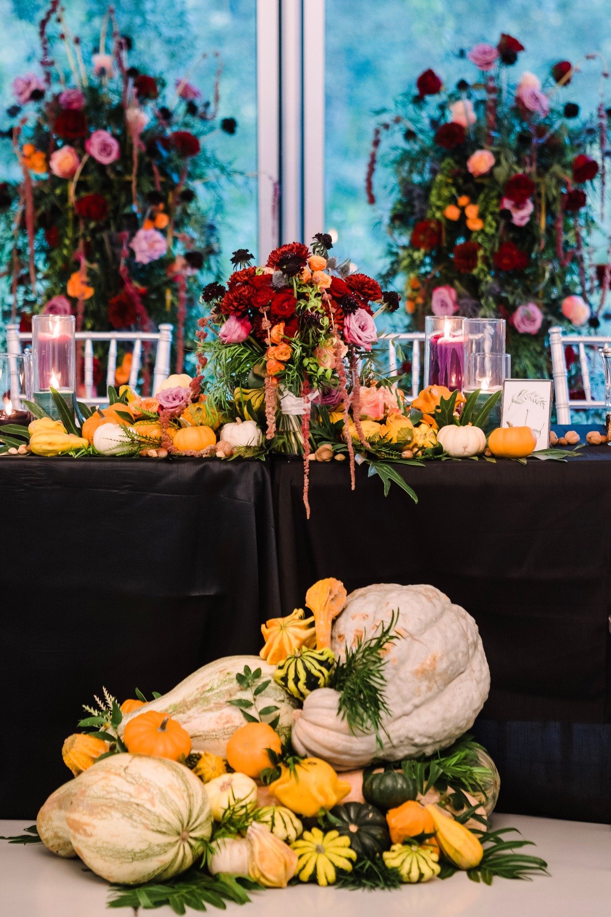 Luscious jewel toned floral and squash reception