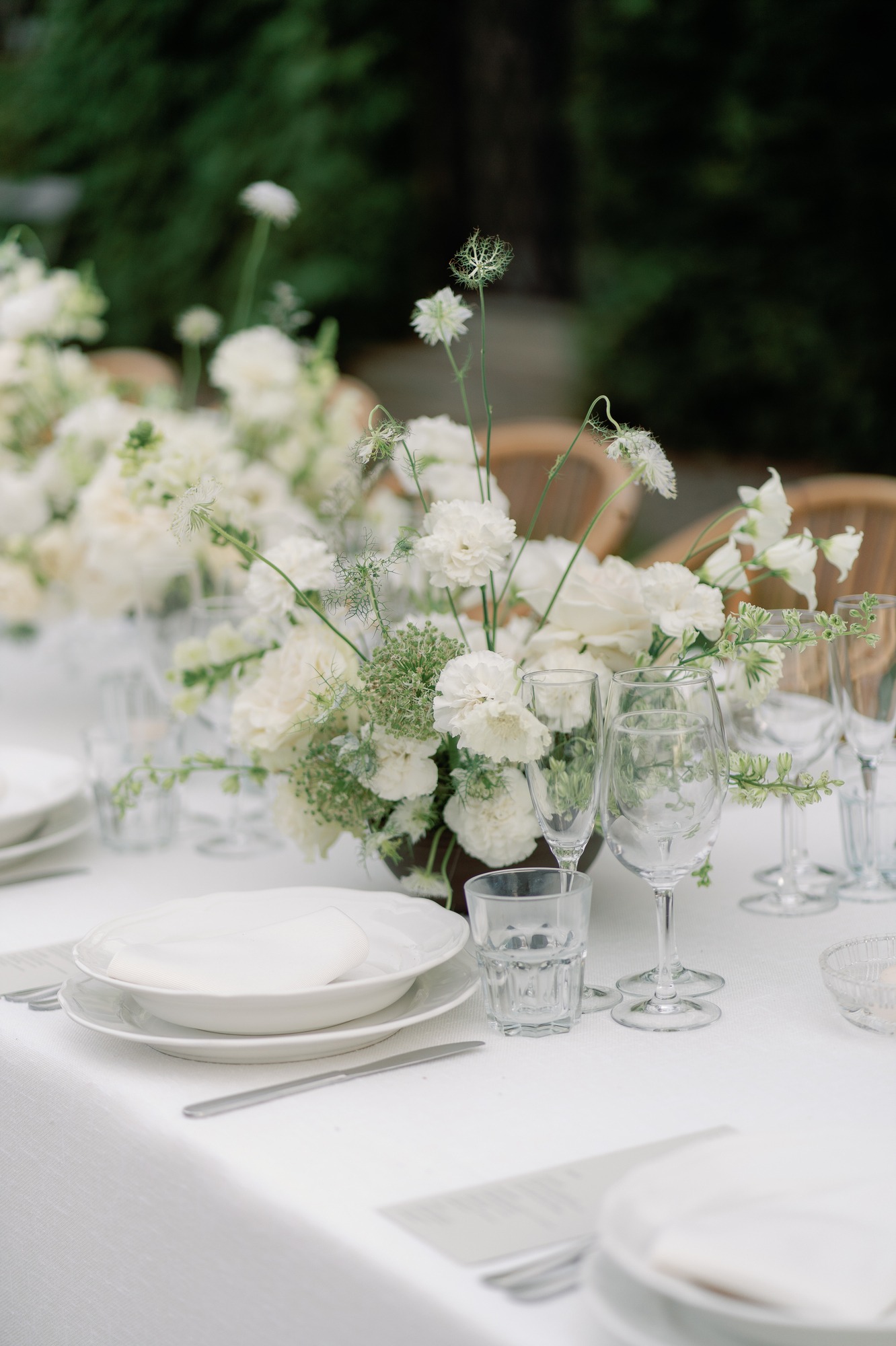 all white and greenery centerpieces