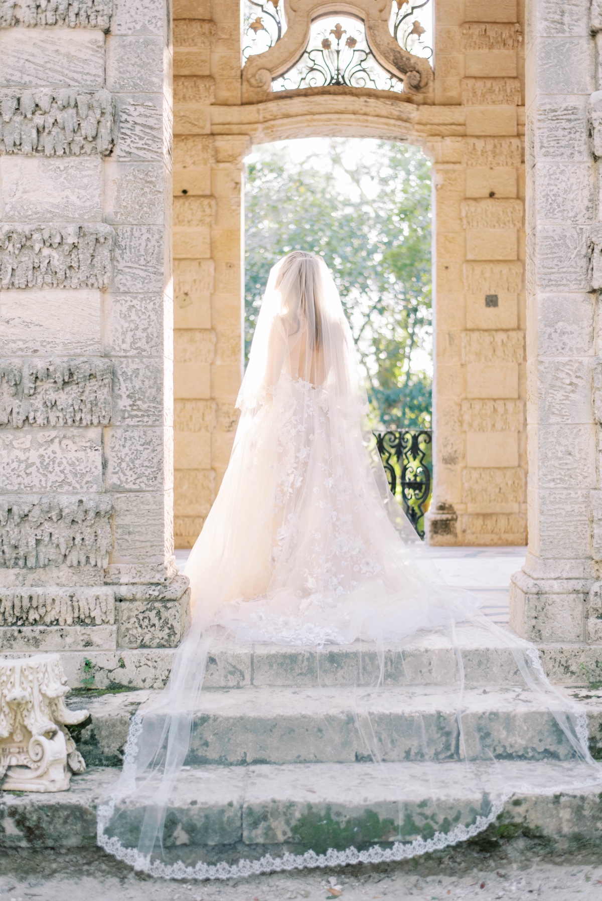 lace-trimmed cathedral length veil