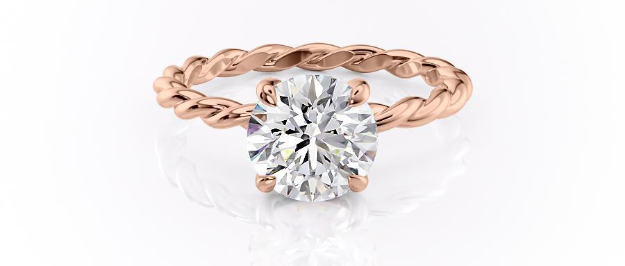 1ct, round cut moissanite engagement ring, with twisted band and hidden halo
